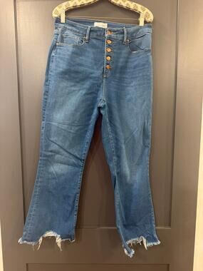 LOFT denim shown in the image is a pair of high-rise kick crop flare jeans